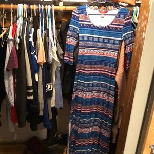 New long dress. With elbow length sleeves.